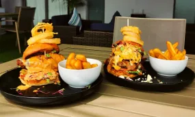 200g Gourmet Burgers with Rustic Fries and Onion Rings at The Hyde Hotel